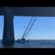 Sailboat stuck under the I-110 bridge in Biloxi, Mississippi