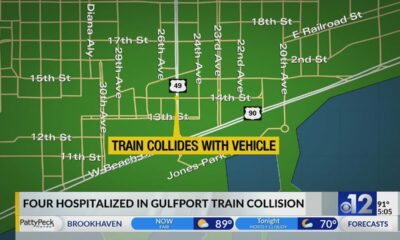 Four hospitalized in Gulfport after train, car collide