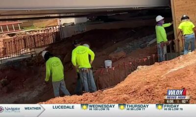 Local construction workers dealing with intense summer heat