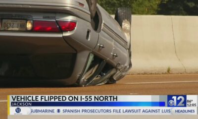 Vehicle flips on I-55 North in Jackson