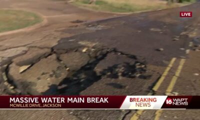 Water main break shreds street