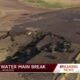 Water main break shreds street