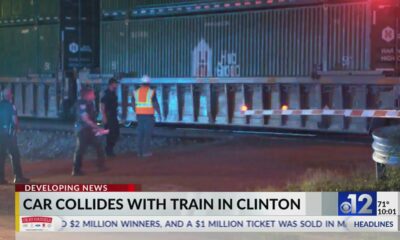 Two injured after car collides with train in Clinton