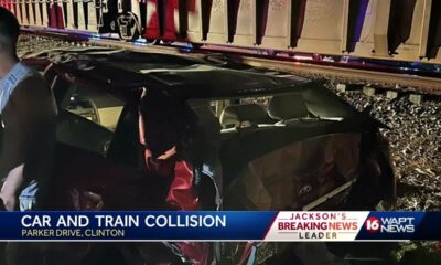 2 injured when train hits car in Clinton