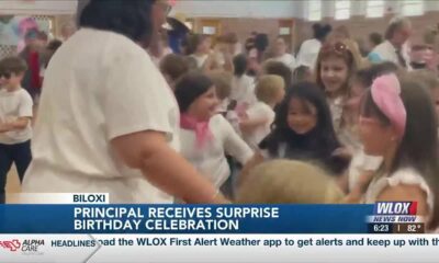 Elementary School in Biloxi surprises principal for 50th birthday with sock-hop celebration