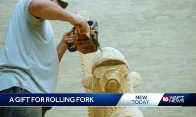 Artist carves bear sculpture for Rolling Fork