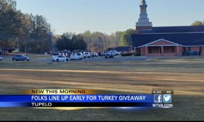 Many folks waited in line for a turkey giveaway at a Tupelo church over the weekend