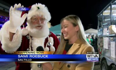 WTVA's Sami Roebuck talks to Santa at Saltillo's Sip and Shop event