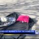 Local group hands out warm weather gear to homeless