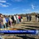 Oxford students plant trees at high school