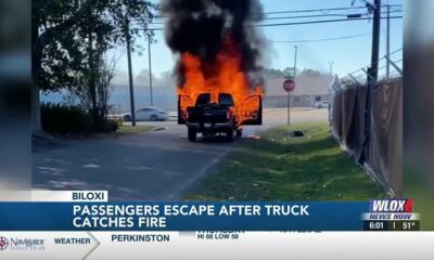 Passengers escape after truck catches on fire in Biloxi