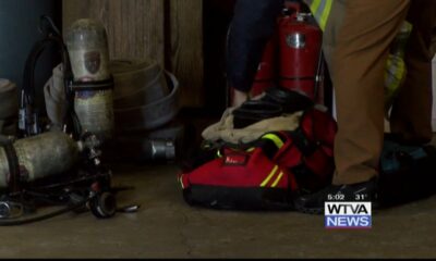 Firefighter reacts to extreme cold weather after fire fight