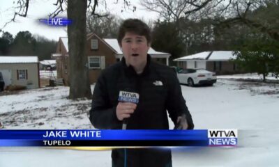 WTVA reporter Jake White demonstrates how icy the roads are in Tupelo