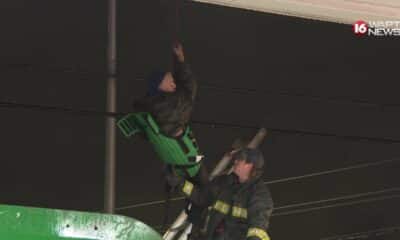 Video: Man rescued from inside garbage truck