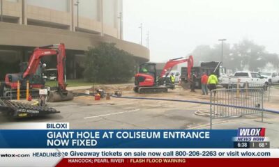 Crews dig a giant hole to repair water line at the Mississippi Coast Coliseum