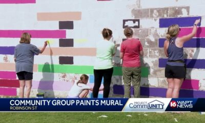 Local artists paint mural at Jackson library