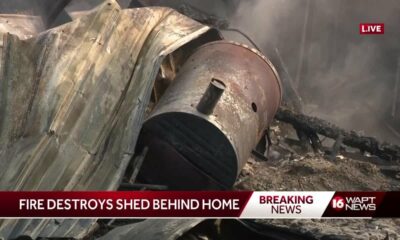 Fire destroys shed behind Jackson home