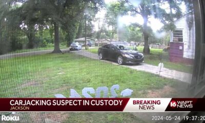 Suspect arrested in carjacking caught on camera