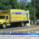 Railroad bridge in Jackson tears roof off truck