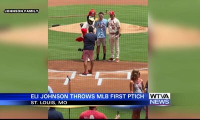 Eli Johnson throws first pitch at St. Louis Cardinals game over the weekend