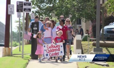 Kids take part in Fourth of July Parade