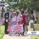 Kids take part in Fourth of July Parade