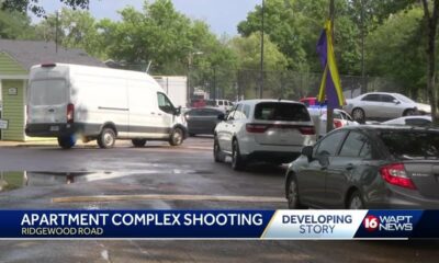 2 people in custody after apartment shooting