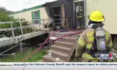 Resident, parrot rescued from mobile home fire in Harrison County