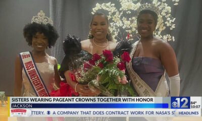 Sisters wear pageant crowns together with honor