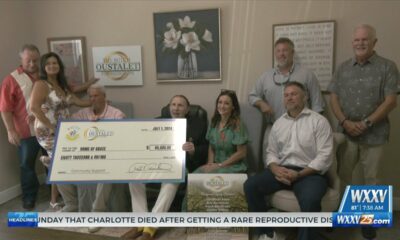 Butch Oustalet Foundation gives donation to Home of Grace