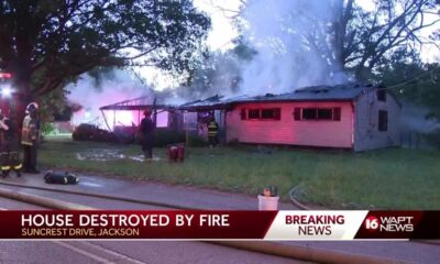 house goes up in flames on Suncrest Drive