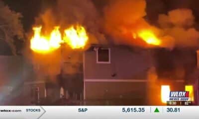 Crews battle overnight house fire in Biloxi