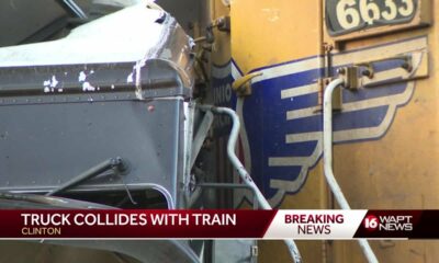 UPS driver injured after train collides with his truck in Clinton