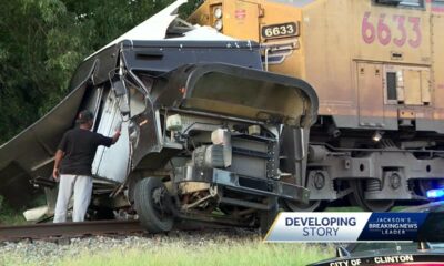 Train crashes into UPS truck in Clinton