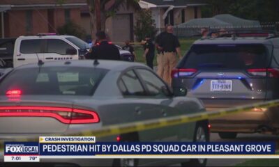 Woman hit by Dallas police squad car