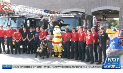 Gulfport Fire Department swears in honorary firefighter