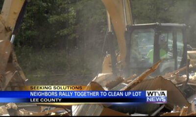 Lee County neighbors rally together to clean up lot