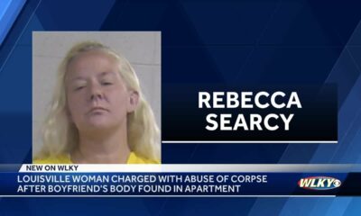 Louisville woman arrested after body wrapped in shower curtain found in apartment