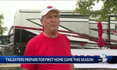 Fans gear up for tailgating ahead of the first Hogs home game