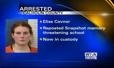 Woman arrested after reposting school threat in Calhoun County