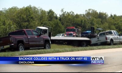 Backhoe, truck involved in crash near Okolona