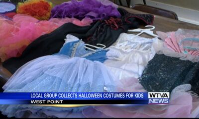 Group collecting Halloween costumes for kids in West Point