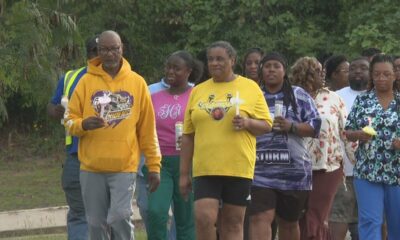 Denisha Knight’s family hosts a candlelight vigil walk in honor of her memory