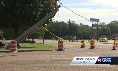 Downed pole and traffic lights frustrating neighbors