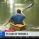 Tampa residents try to navigate floodwaters left behind by Hurricane Milton