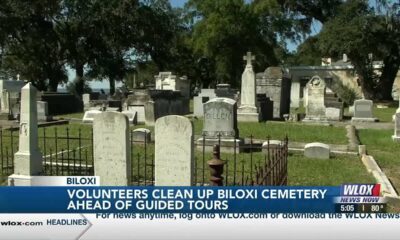 Volunteers clean up Biloxi Cemetery ahead of guided tours