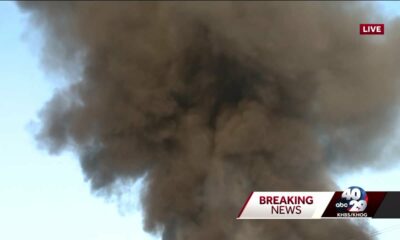 Fire sends smoke billowing into the air near Rogers airport