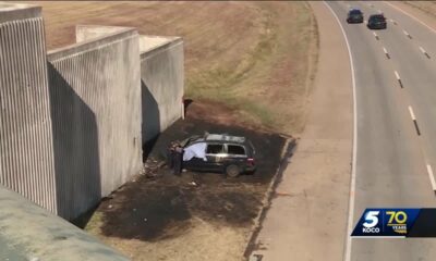 OKCFD: Person dies after vehicle crashes into wall, catches fire along Lake Hefner Parkway