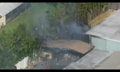 Fire contained to backyard of Hollywood homes