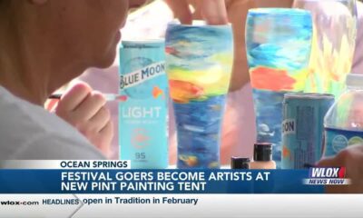 Peter Anderson festival-goers become the artists at new Blue Moon pint-painting tent